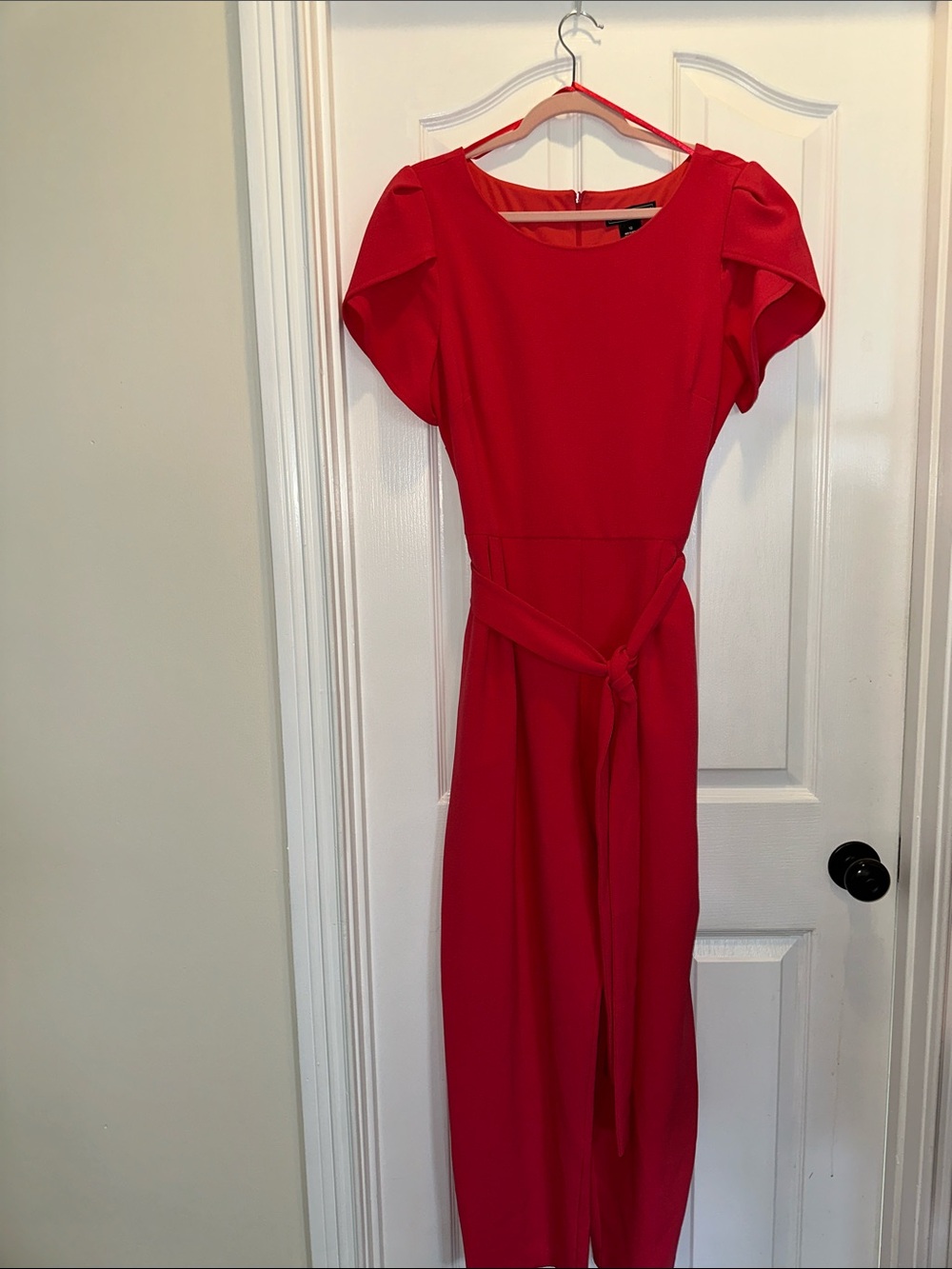 Jessica Howard orange Midi Jumpsuit with Tie Waist. Never worn  58 in long.